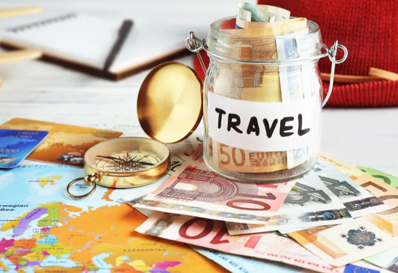 Budget travel jar for exploring cheap activities while saving money