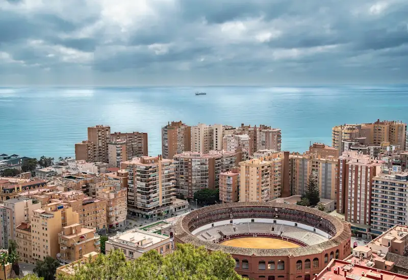 View of Málaga city with the bullring and sea in the background