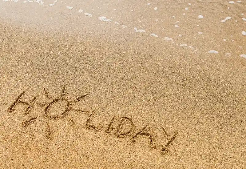 A sandy beach from a holiday after saving on flights, hotels, and holiday packages